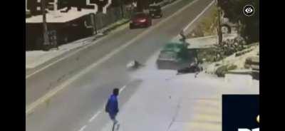 Motorcycle crashes into a Tuk Tuk