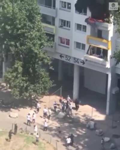 Two boys—ages 10 and 3–jumped 30 feet from a burning building in Grenoble, France. Two of the six adults who caught them broke their arms. Amazing heroism all around.