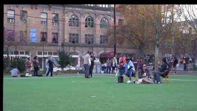 Couple let their dog run around loose in the park. 
Looks like it annoyed everybody.