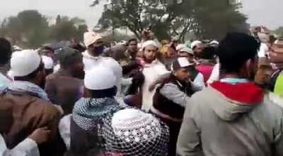 COVID vaccine truck stopped by TMC leader Siddiqullah Chowdhury. Watch as he violently hurls stick at those trying to make way for vaccine