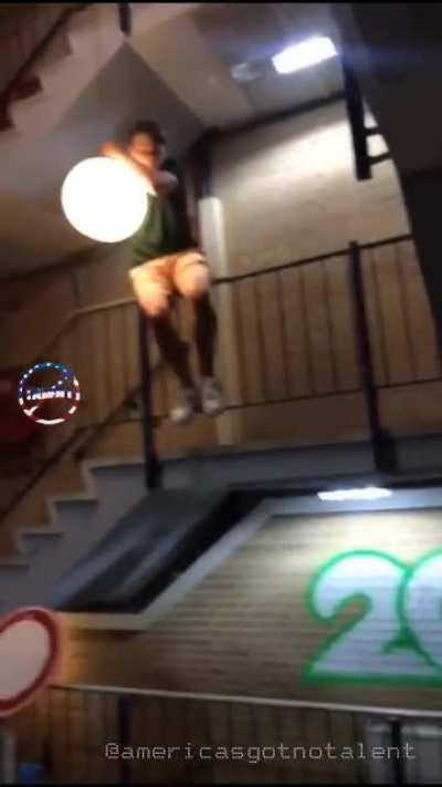 WCGW swinging from a chandelier