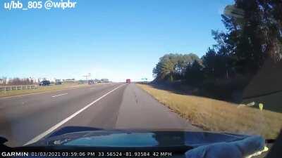 Driver going the wrong direction on the interstate crashes head on at 70mph into another car. Both drivers walked away with no major injuries