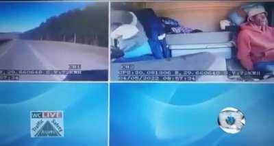 Instead of pulling to the side and take a few seconds, moron decides to take off hoodie while driving