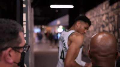 [Highlight] Giannis casually saves a fan's phone as he exits the court