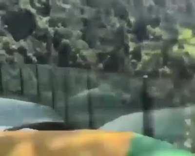 Putting your trust in a short glass wall - Sandu cliff water slide in China