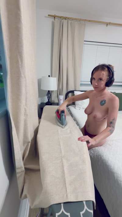 Doing some topless curtains ironing 💦
