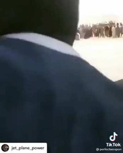 (Appears to be) somebody holding onto the C17 landing gear