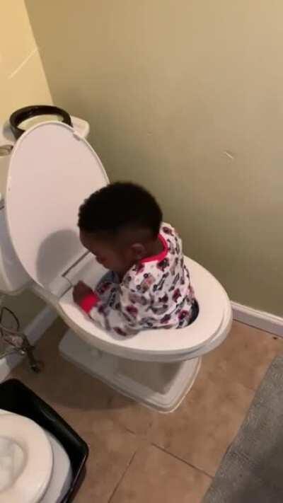WCGW sitting in the toilet.