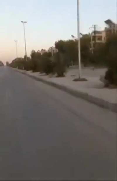 HTS driving through Aleppo