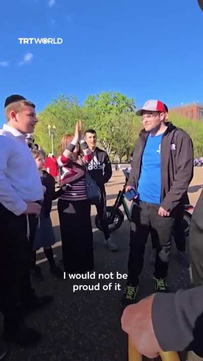 Protester in USA threatening to deport Holocaust Survivor and admitting to killing children
