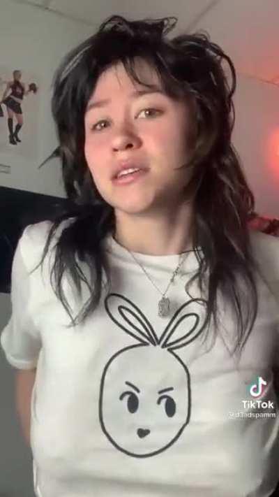 Braless with pierced nipple poking through