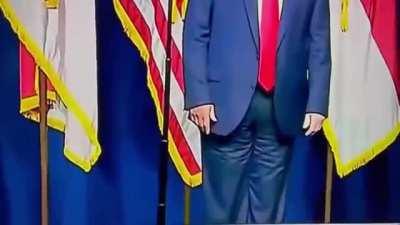 Guy goes on stage with backwards pants