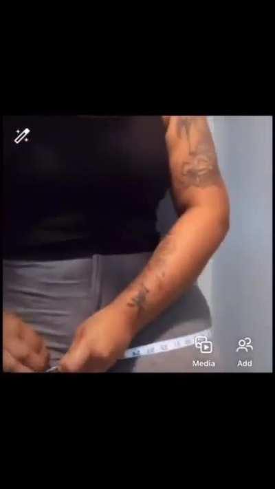 Measuring her enormous booty