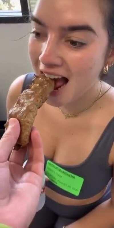 Natalie eating a Kabob