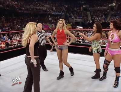 Trish convinces the divas  to go with her and leave the ring