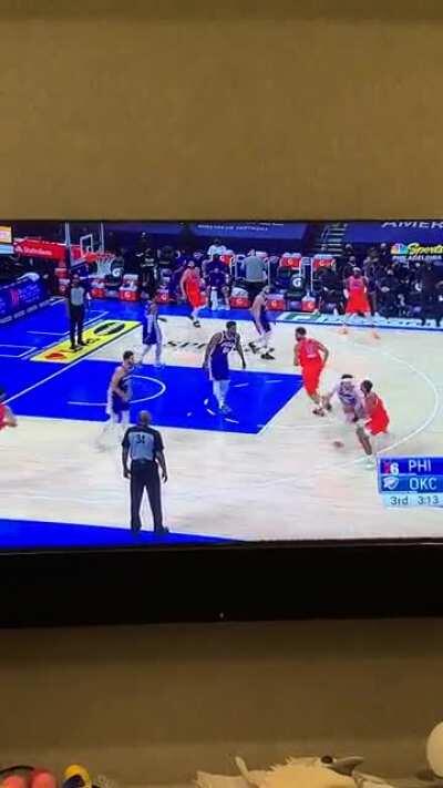 Joel gets bonked by the rebound and goes down