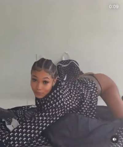 Coi Leray throwing it back