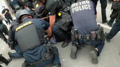 Louisville police arrest 2 people and confiscate firearm