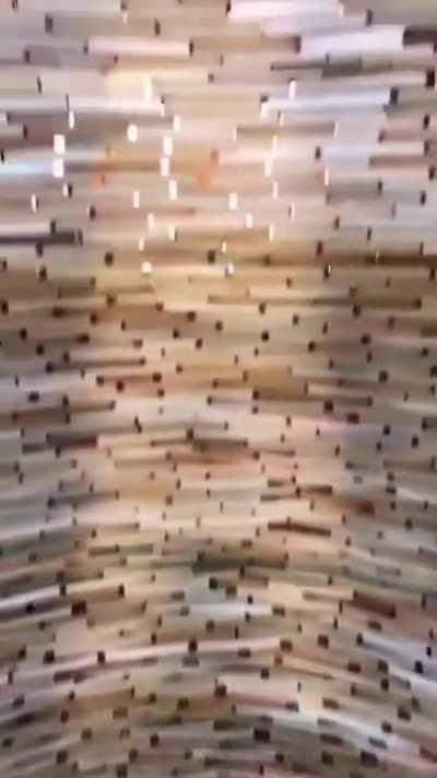 An infinite tower of books, an art installation called Idiom, by artist Matej Kren