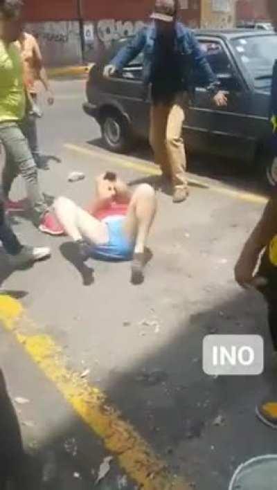 Tries to steal a ladies cell phone, gets beaten and striped naked.