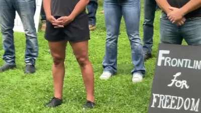 Silent protest against mandatory vaccinations for first responders held at Queen's Park