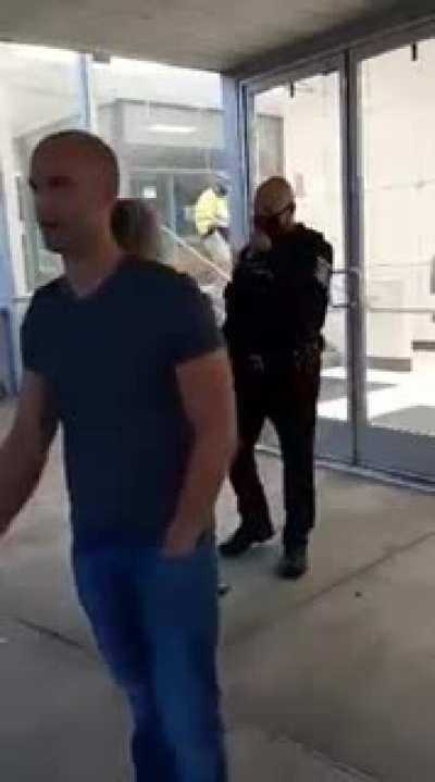 Argues with police about masks in school. Gets arrested.