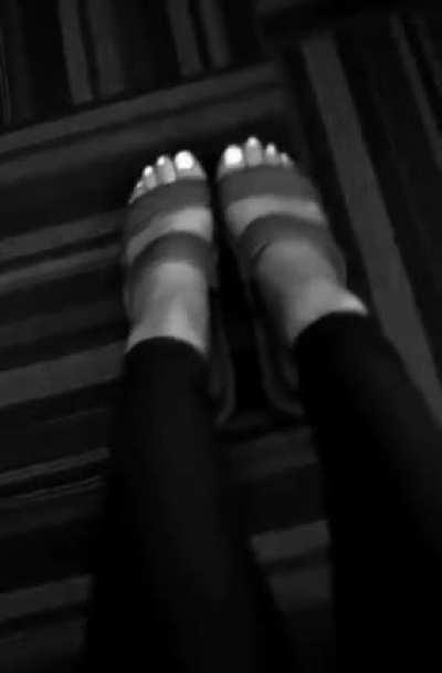 Showing off her perfect feet
