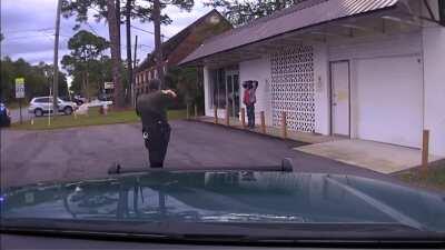 What happens when you defy a cop with a taser and you have a magazine full of ammo in your back pocket?