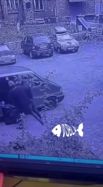 Employees of the Ukrainian mobilization service conduct an explanatory conversation with a 