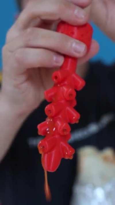 THE HOT SAUCE SYRINGE