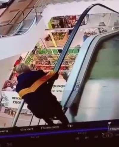 Why you don't hold onto a moving escalator handrail