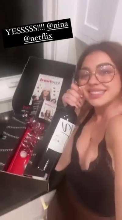 Opening a gift from Nina Dobrev