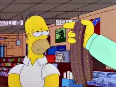 Homer Simpson buys a gun