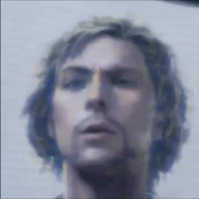 << Look at this photograph. >>