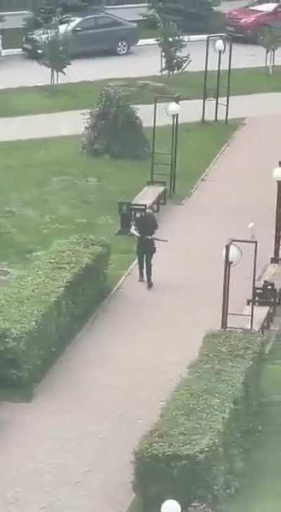 Video of Perm University shooter walking the street armed, without watermark