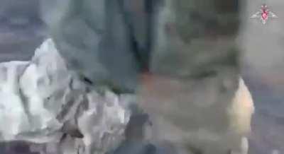 Russia soldiers drag and stack up dead ukrainian nazis