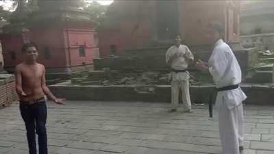 Guy challenges black belt