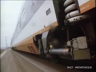 A Transall C-160 following the TGV on the day of its world record on February 26, 1981 - 381kph