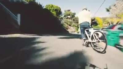 had the camera rigged to film downhill skateboarding and my bike nearby so I gave it a go