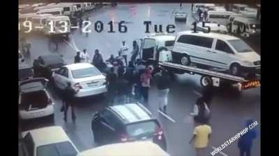 Carjacking gone HORRIBLY wrong: Car thieves who tried to rob an elderly man get beaten up by the entire street