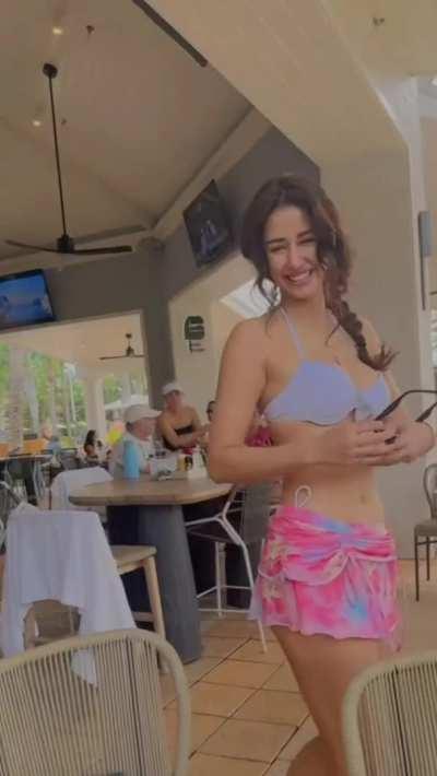 Trash cumdumpster parading half naked in a family cafe. This bitch has stooped so low that she is now openly selling her body to foreigners and NRI men.