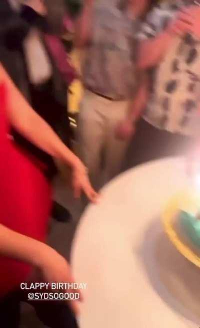 Ready to burst out of her birthday dress…