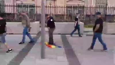 Balkanoids stepping on Greek flag 🏳️‍🌈