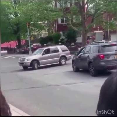 Anti-protestor charges at protestors with Halo 3 style sword