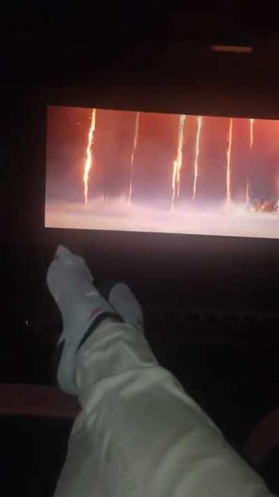 My feet enjoying a day at the movies