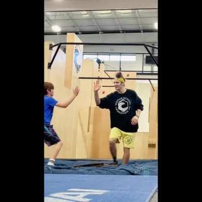 A boy was convinced he couldn't do a backflip, but a man proved him wrong