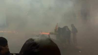 Georgian Protestor with Firework Gatling Gun vs Water Jet