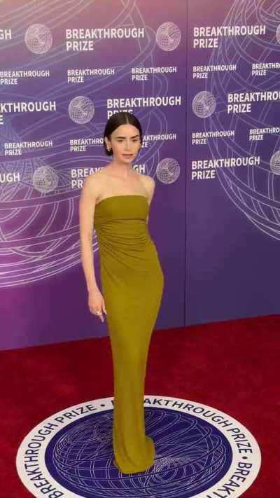 Lily Collins stuns in green at the 2026 Breakthrough Prize red carpet