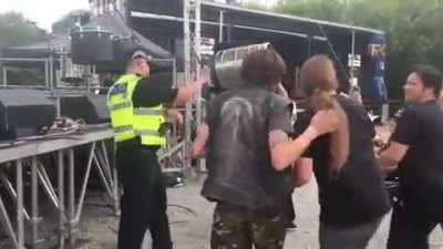 Bat bounces off beer keg and smacks guy in head while playing with Slipknot cover band.