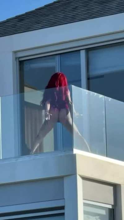 Throwing ass on a balcony